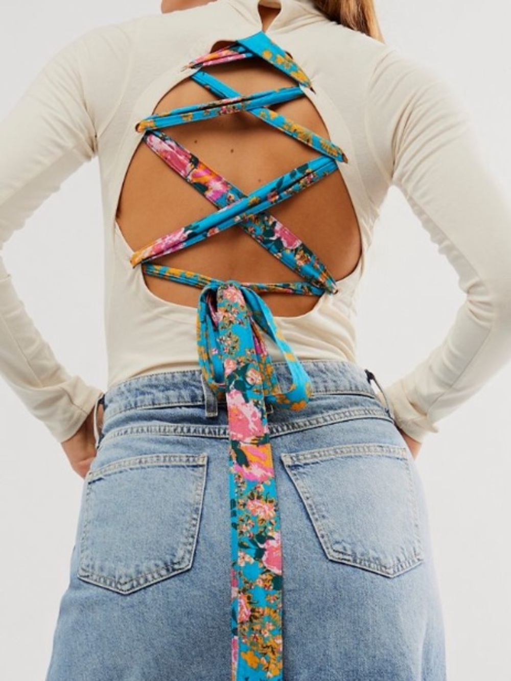 Free People body suit with colorful open tie back